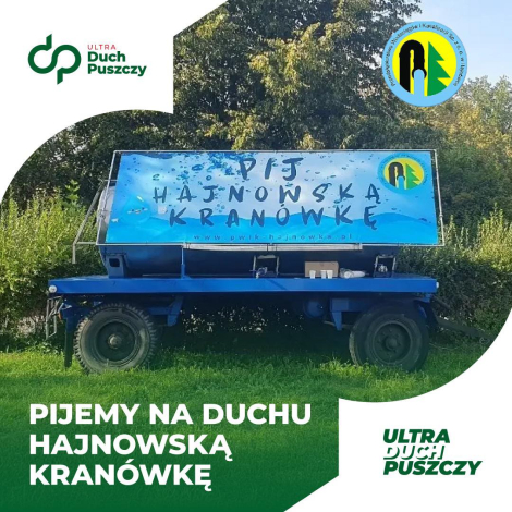 Zdjęcie cysterny z hajnowską kranówką, u dołu napis: "pijemy na Duchu hajnowską kranówkę"